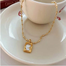 Load image into Gallery viewer, Stylish Gold Chain Necklace with Open Rectangular Pendant &amp; Sparkling White Gem – Perfect Minimalist Accessory for Any Occasion
