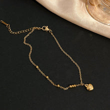 Carica l&#39;immagine nel visualizzatore di Gallery, Enchanting Heartbeat Anklet | Dainty Gold-Toned Elegance for Baju Kurung